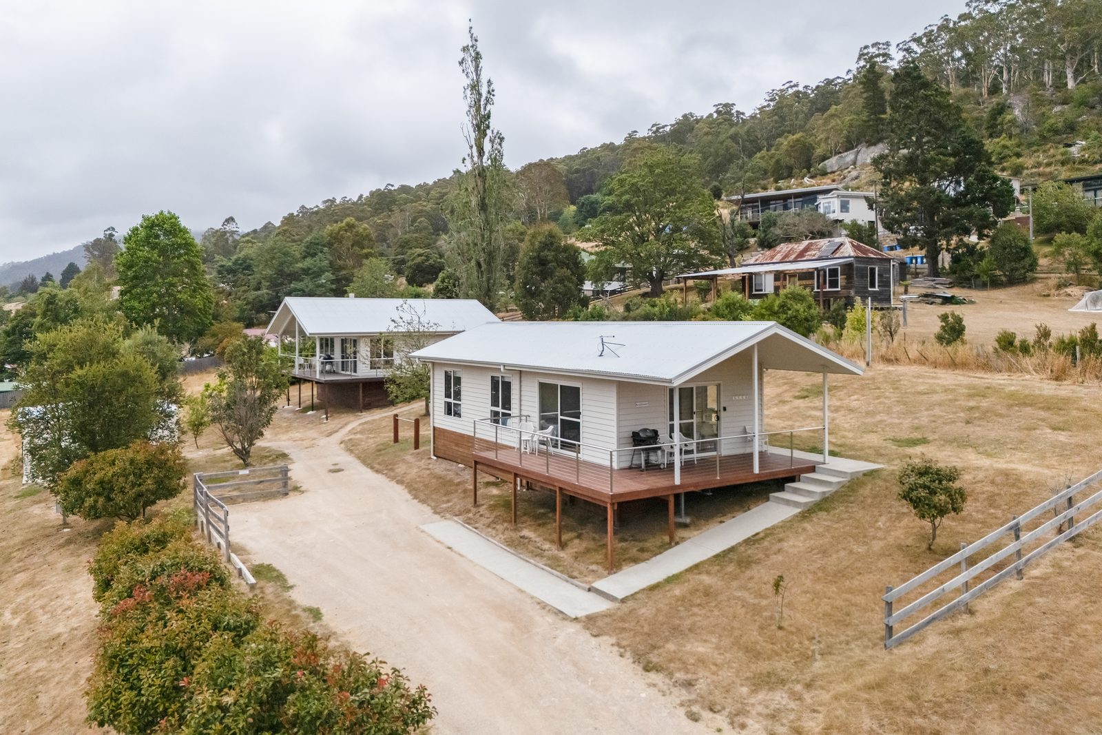 The Derby Double twin timber cabins perched on the hillside above Ringarooma River